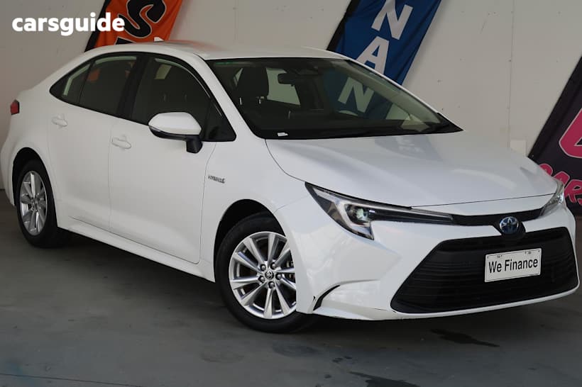 White 2022 Toyota Corolla Sedan ASCENT SPORT HYBRID F