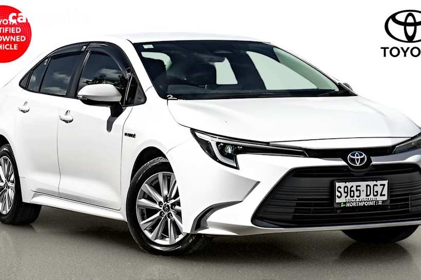 White 2024 Toyota Corolla Sedan SX HYBRID F