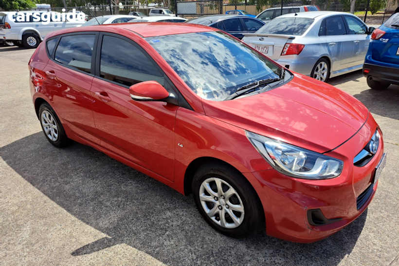 Red 2011 Hyundai Accent Hatchback Active