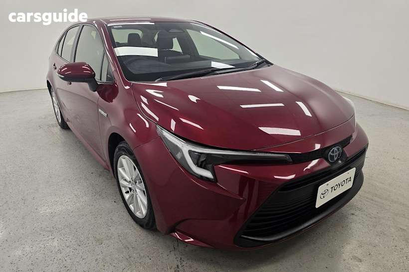 Red 2023 Toyota Corolla Sedan ASCENT SPORT HYBRID F