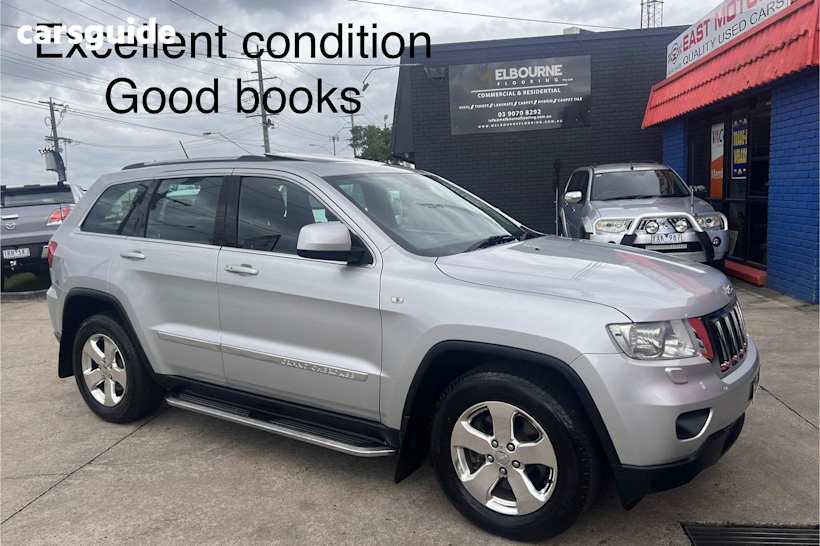 Silver 2013 Jeep Grand Cherokee SUV LAREDO 4X4