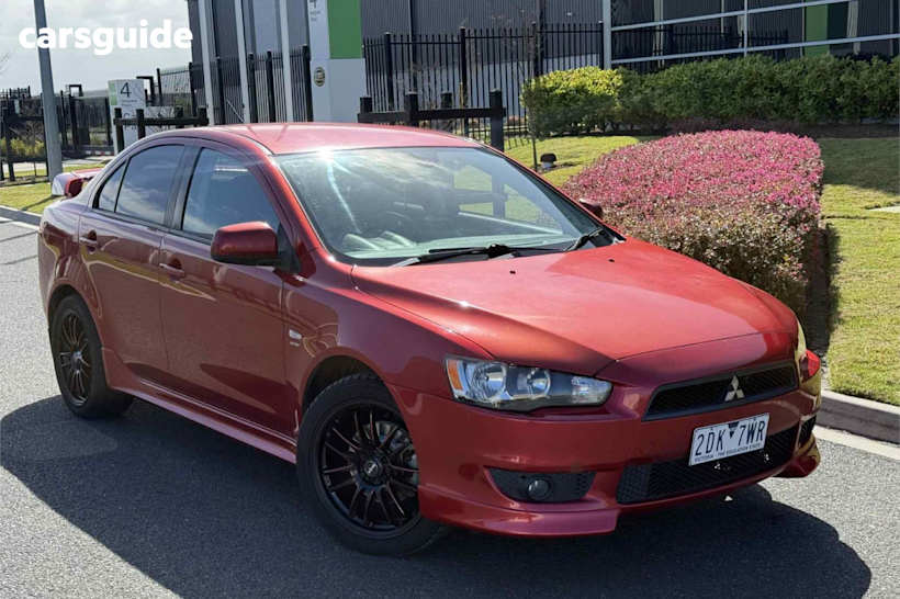 Red 2007 Mitsubishi Lancer Sedan VR-X F