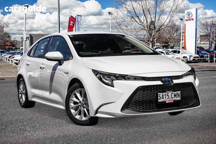 White 2021 Toyota Corolla Sedan ASCENT SPORT HYBRID F