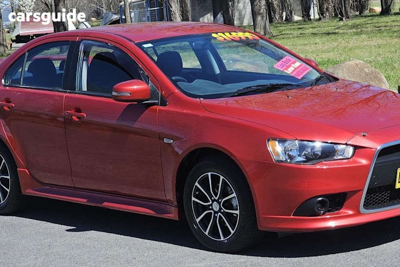 Red 2015 Mitsubishi Lancer Sedan Es Sport