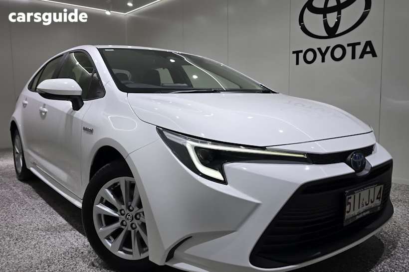 White 2024 Toyota Corolla Sedan ASCENT SPORT HYBRID F