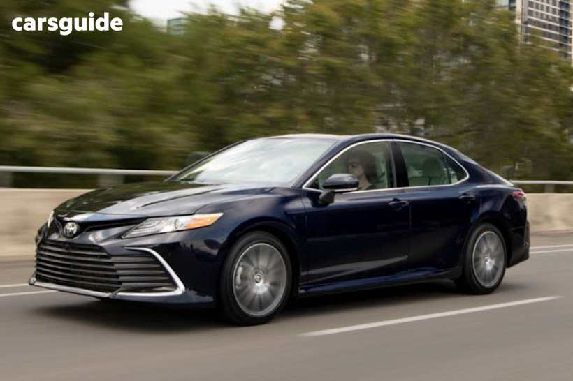 White 2024 Toyota Camry Sedan Sl Hybrid