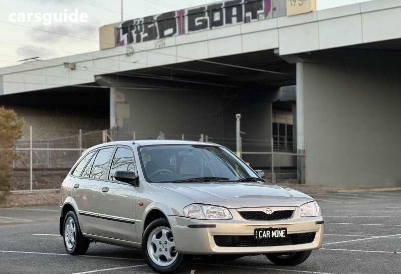 Silver 2000 Mazda 323 Hatch ASTINA F