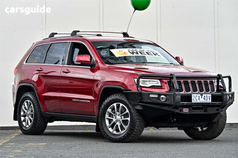 Red 2014 Jeep Grand Cherokee SUV LAREDO 4X4