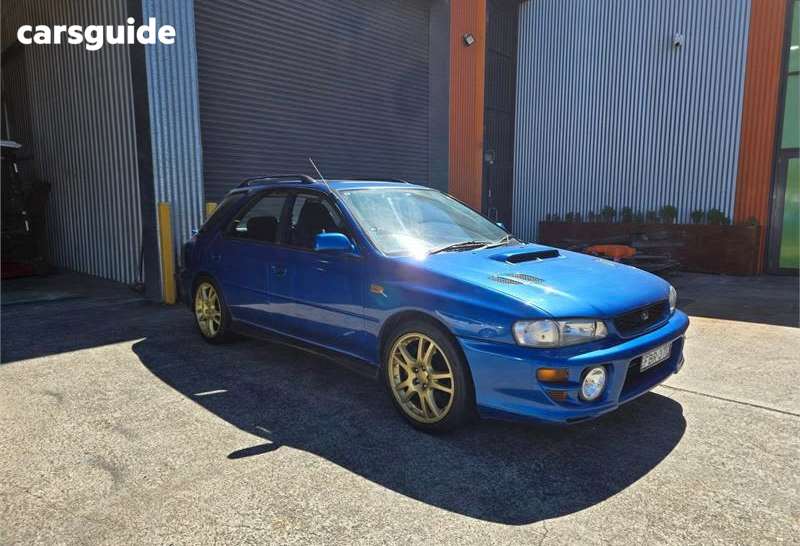 Blue 2000 Subaru Impreza Hatch WRX CLUB SPEC EVO IV 4WD