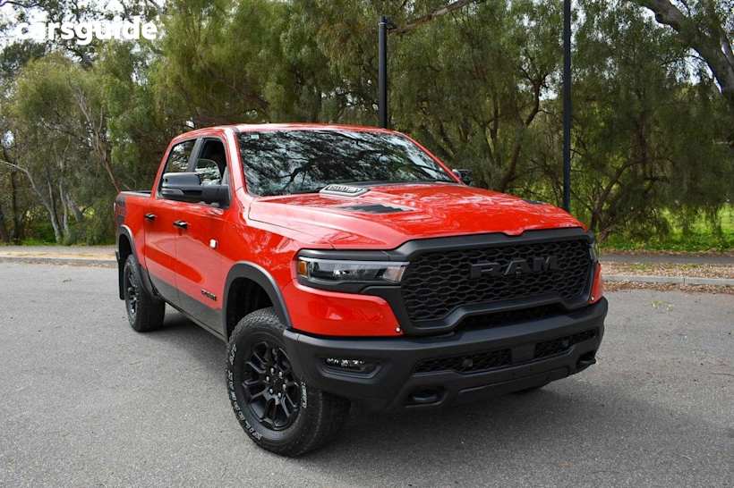 Red 2025 Ram 1500 Crew Cab Utility Rebel Hurricane