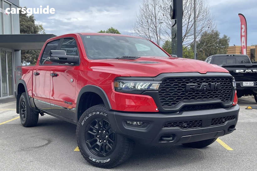 Red 2025 Ram 1500 Crew Cab Utility Rebel Hurricane