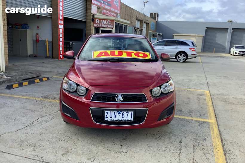 Burgundy 2013 Holden Barina Sedan Cdx