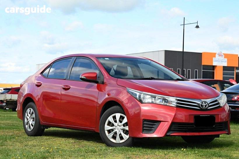 Red 2015 Toyota Corolla Sedan Ascent