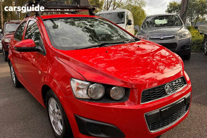 Red 2015 Holden Barina Sedan Cd