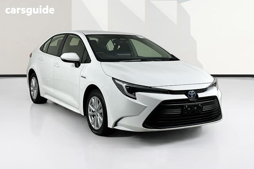 White 2023 Toyota Corolla Sedan Ascent Sport Hybrid