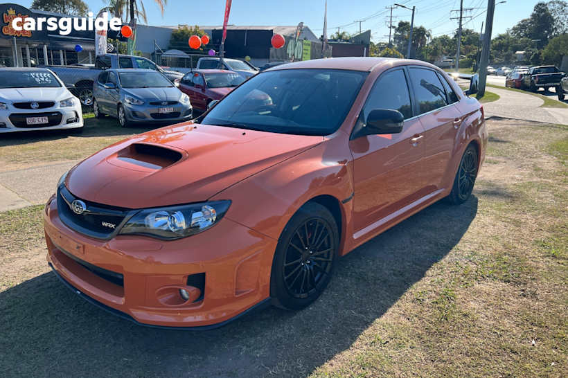 Orange 2012 Subaru WRX Sedan Club Spec (Awd)