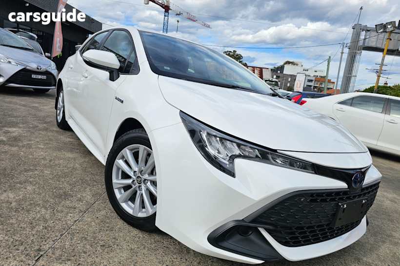 White 2023 Toyota Corolla Hatchback Ascent Sport Hybrid