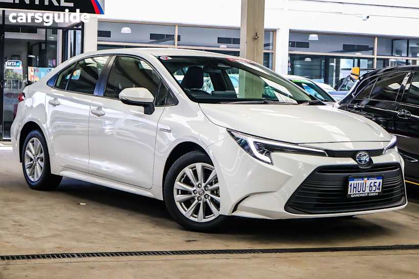 White 2023 Toyota Corolla Sedan ASCENT SPORT HYBRID F