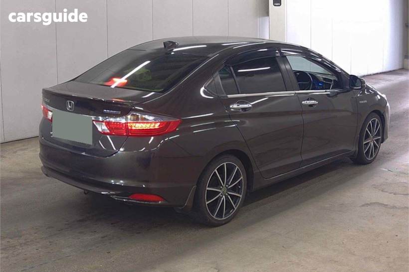 Brown 2015 Honda Grace Sedan HYBRID EX