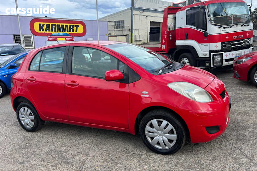 Red 2011 Toyota Yaris Hatchback Yr