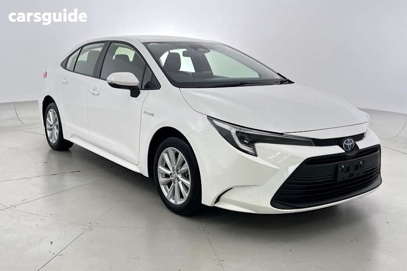 White 2024 Toyota Corolla Sedan ASCENT SPORT HYBRID F