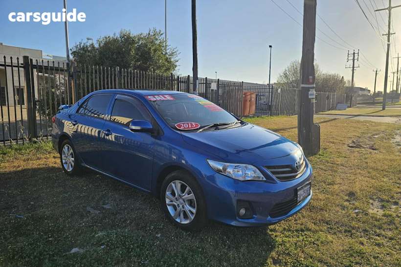 Blue 2013 Toyota Corolla Sedan Ascent Sport