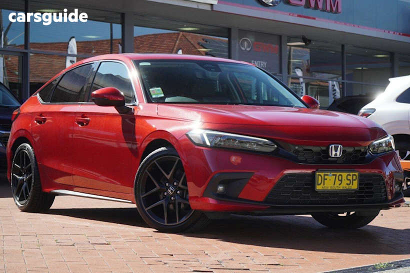 Red 2022 Honda Civic Hatch E:HEV LX F