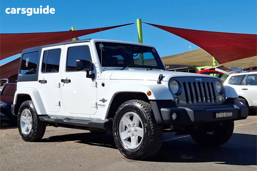 White 2014 Jeep Wrangler Sedan UNLIMITED FREEDOM IV 4X4