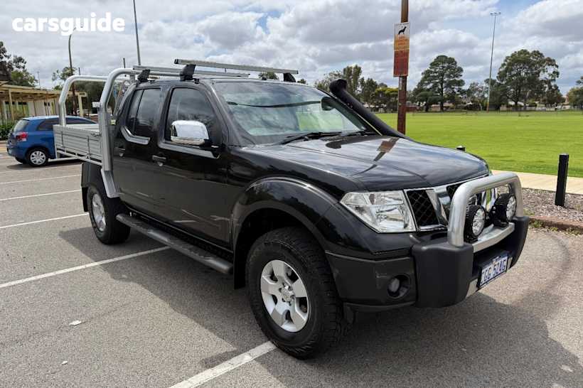 Black 2009 Nissan Navara Dual Cab Pick-up St-X (4X4)