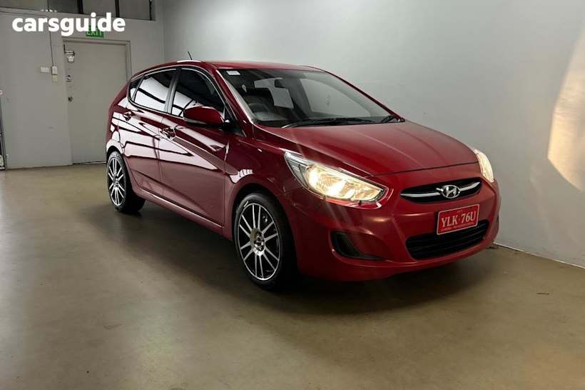 Red 2015 Hyundai Accent Hatchback Active
