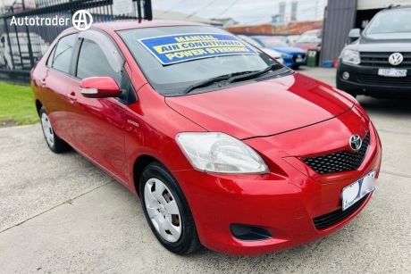 Red 2010 Toyota Yaris Sedan YRS