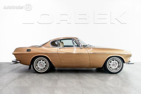Yellow 1972 Volvo P1800 Coupe E