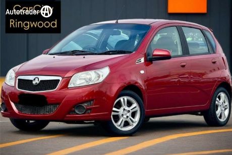 Red 2011 Holden Barina Hatch