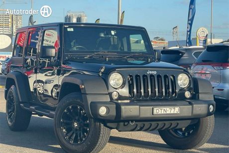 Black 2018 Jeep Wrangler Unlimited Softtop Sport (4X4)
