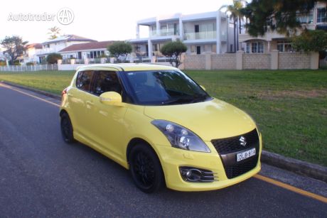 Yellow 2016 Suzuki Swift Hatchback Sport Navigator