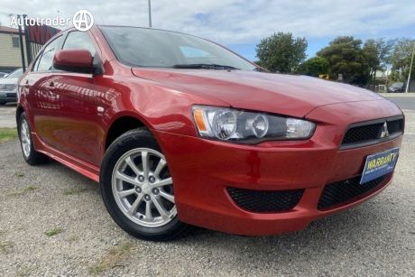 Red 2010 Mitsubishi Lancer Hatch