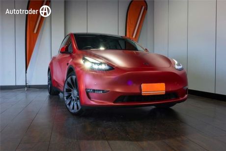 Red 2023 Tesla Model Y Wagon Performance