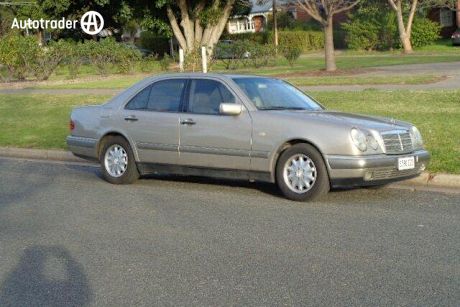 Yellow 1999 Mercedes-Benz E240 Sedan Elegance
