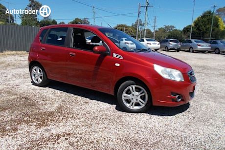 Red 2011 Holden Barina Hatchback