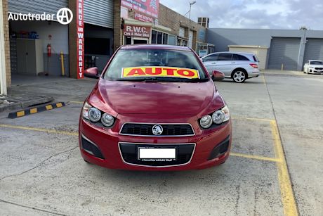 Burgundy 2013 Holden Barina Sedan Cdx