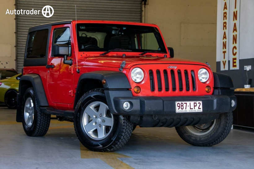 Red 2013 Jeep Wrangler Hardtop Renegade Sport (4X4)